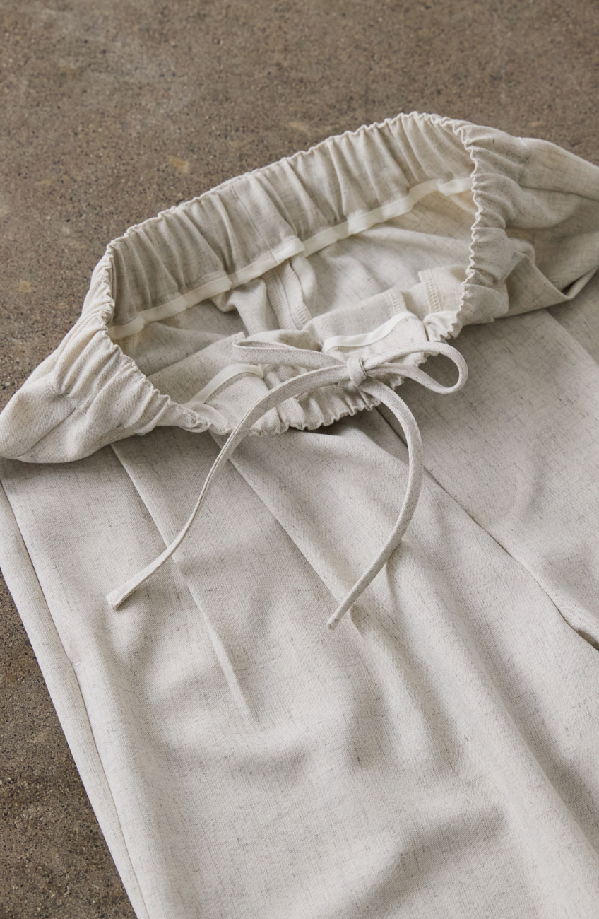 メランジゆるテーパードパンツ